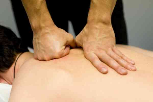 Revamp Sports Massage Therapist in Colorado Springs giving deep tissue massage
