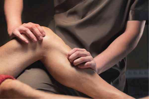 Revamp Sports Massage Therapist in Colorado Springs giving neuromuscular massage