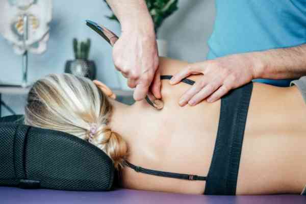 Revamp Sports massage Therapist doing myofascial release in Colorado Springs